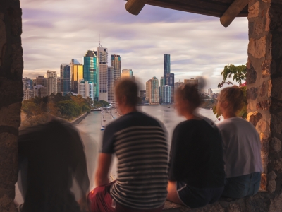 Anonymous teens overlooking Brisbane city