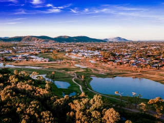 Image of a landscape in north Queensland with a lake and town