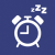 Icon of an alarm clock with zzz's coming out of it